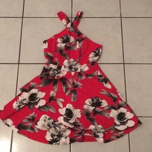 Above the knee high, red dress.